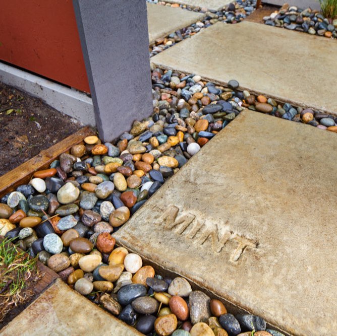An exterior image of the exterior tile and stone landscape elements, designed by N B A architects.