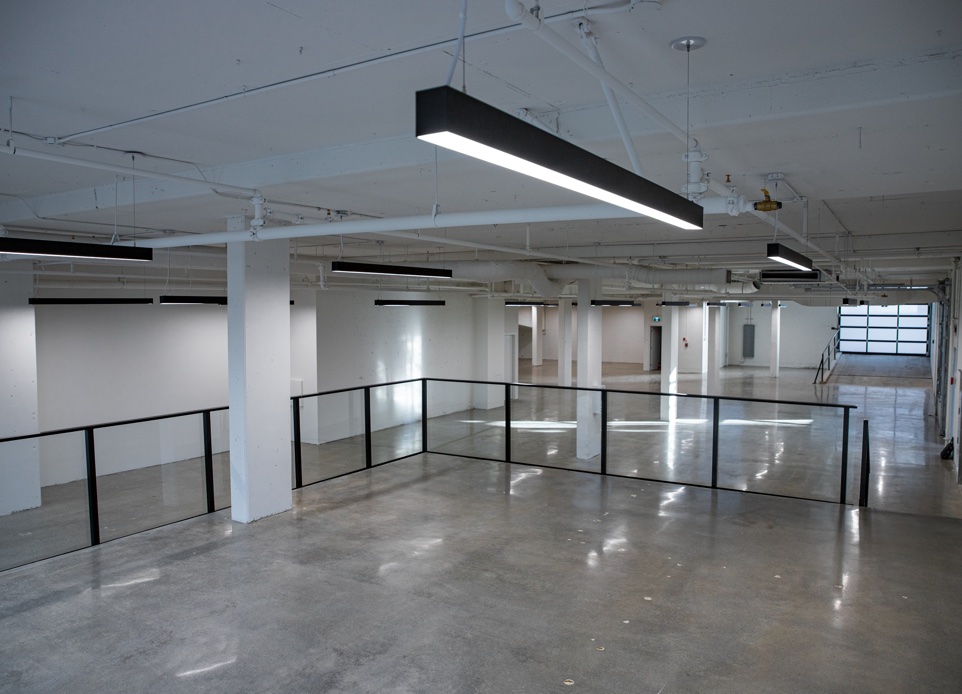 Interior image image of 3-storey mixed-use building in Mount Pleasant. Nba architects designed a 2 floors of office over light industrial commercial space, the intent is to strip out and remodel the interior, demolish the front facade and liven up the streetscape with a redesigned exterior, including three cool outdoor patio spaces.